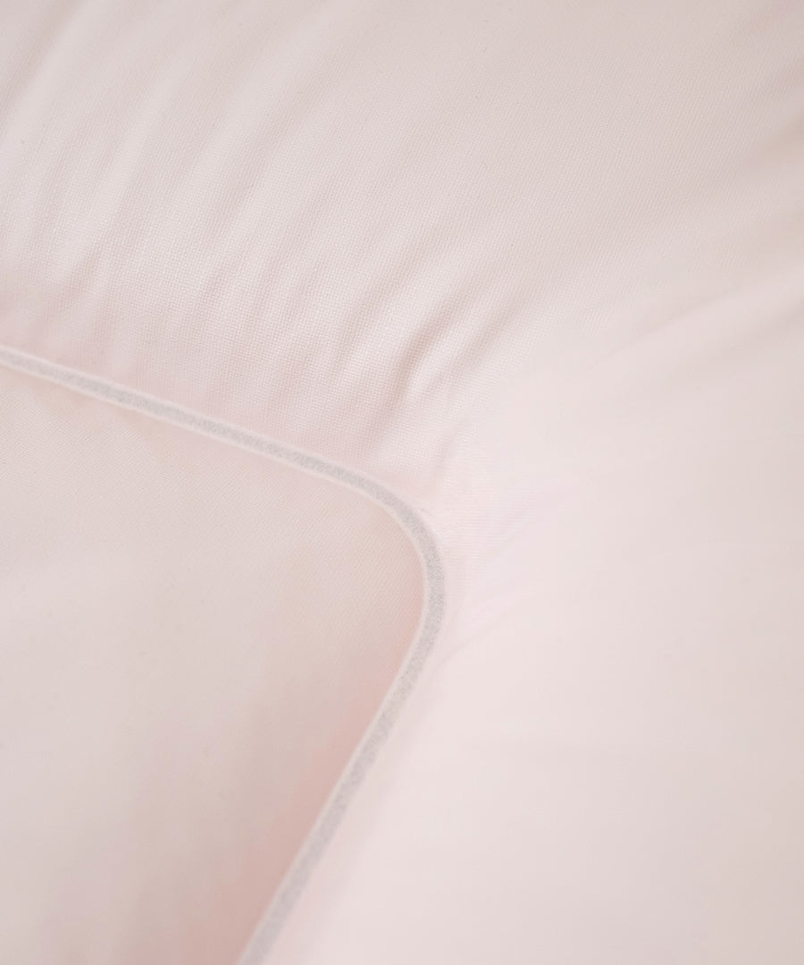 Zeitloses Design*Die Wickelauflage ist in verschiedenen uni- und gemusterten Designs erhältlich - passend zu jedem Einrichtungsstil und Geschmack.|Nahaufnahme Wickelauflage Rosé.